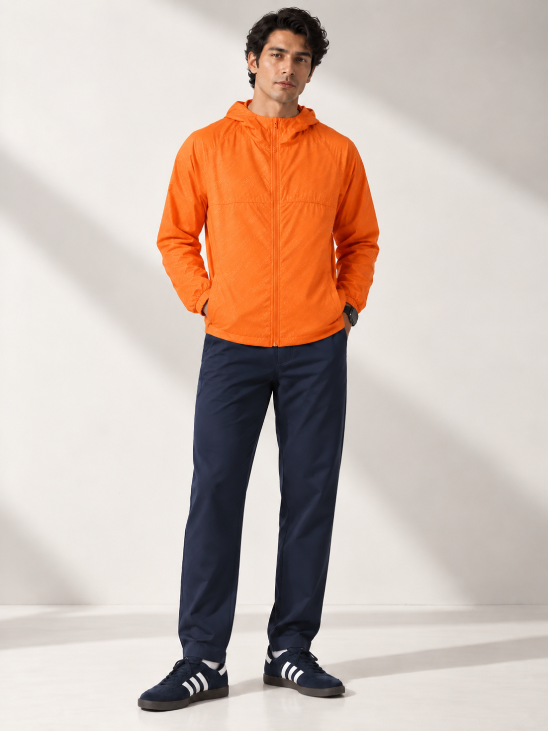 Orange Terra Packable Jacket + Navy Speedwind Commuter Pants