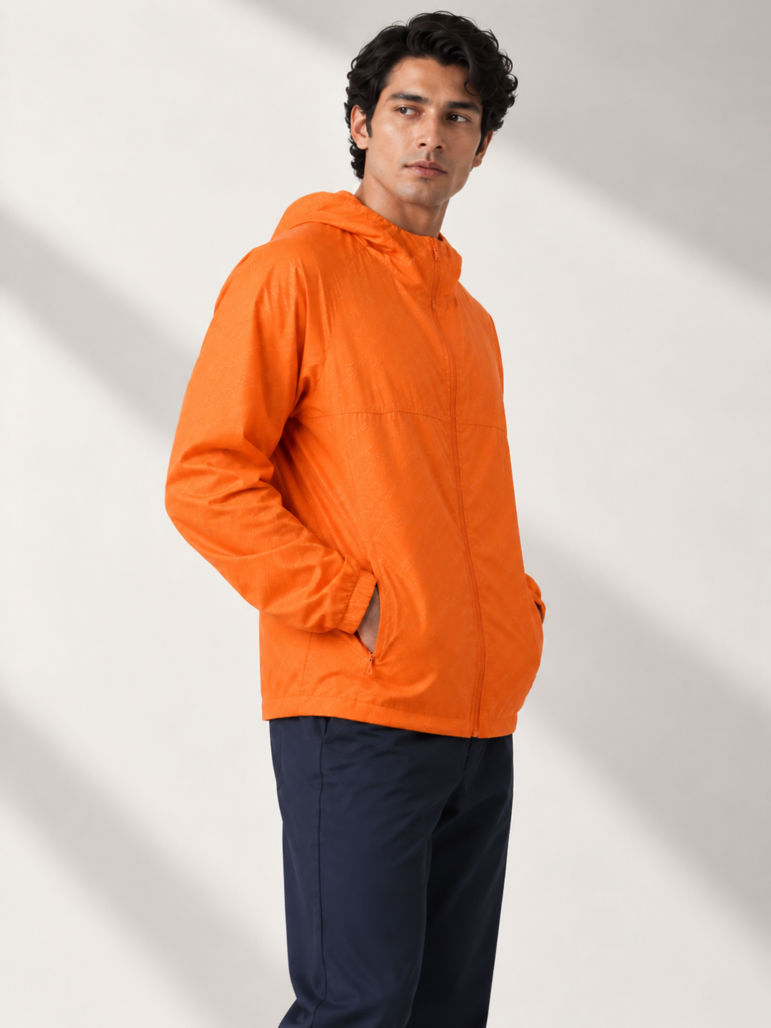 Orange Terra Packable Jacket + Navy Speedwind Commuter Pants