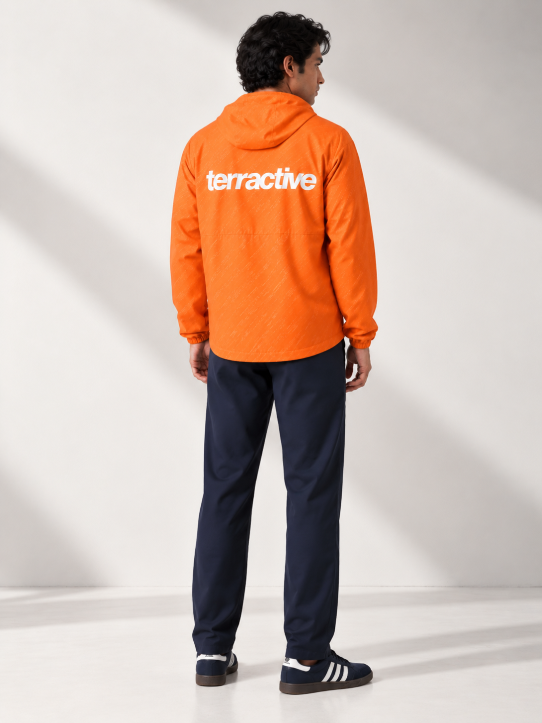 Orange Terra Packable Jacket + Navy Speedwind Commuter Pants