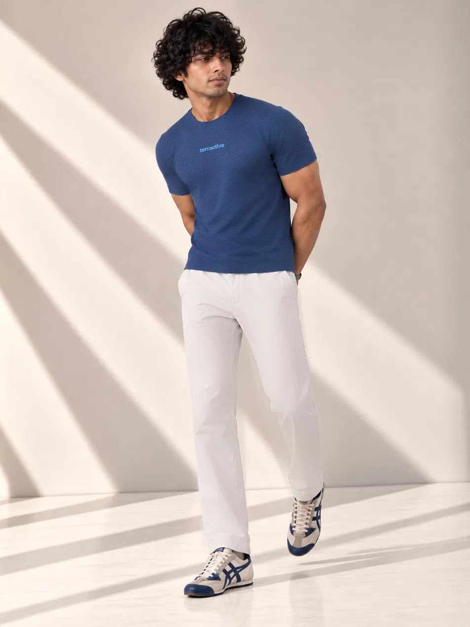 Navy Motion Tee + Stone Speedwind Commuter Pants